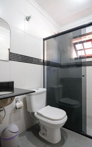 Casa à venda com 203m², 3 quartos e 2 vagasBanheiro da suíte