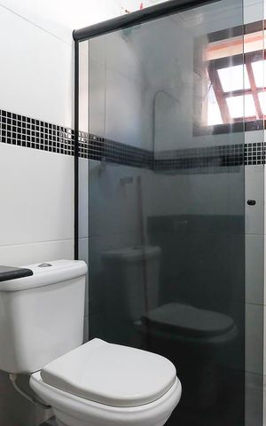 Casa à venda com 203m², 3 quartos e 2 vagasBanheiro da suíte