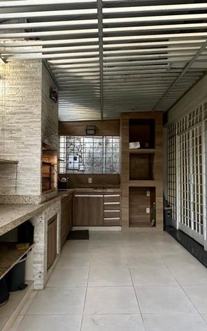 Casa à venda com 321m², 4 quartos e 4 vagas Casa à venda com 321m², 4 quartos e 4 vagasEspaço Gourmet