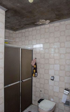 Casa à venda com 304m², 3 quartos e 4 vagasBanheiro da Suíte