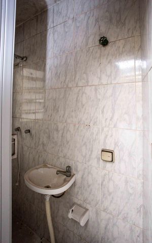 Casa à venda com 304m², 3 quartos e 4 vagasBanheiro 2 Casa 2
