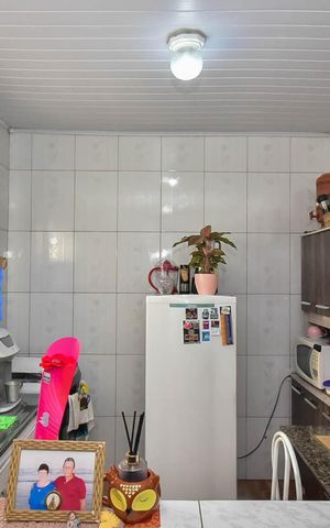 Casa à venda com 143m², 5 quartos e 2 vagas Casa à venda com 143m², 5 quartos e 2 vagasCozinha da Casa 3