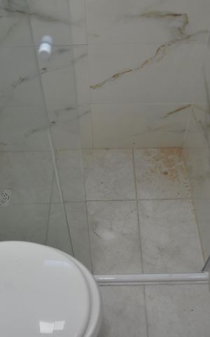 Casa à venda com 114m², 2 quartos e 3 vagasBanheiro da Suíte 1