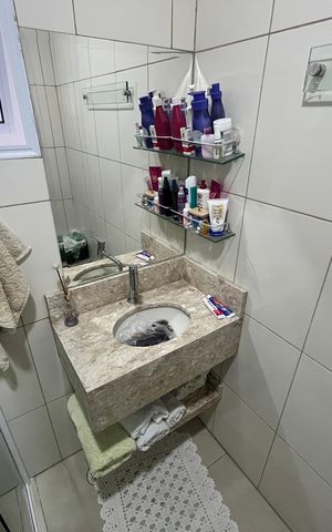 Casa de condomínio à venda com 120m², 3 quartos e 2 vagasBanheiro da Suíte