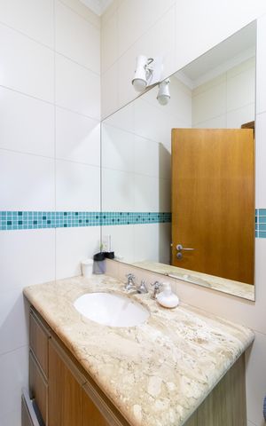 Casa à venda com 256m², 3 quartos e 4 vagasBanheiro da Suíte 1