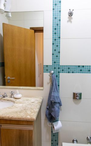 Casa à venda com 256m², 3 quartos e 4 vagasBanheiro da Suíte 1