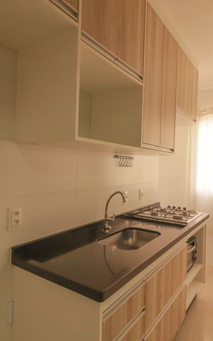 Casa à venda com 54m², 2 quartos e 1 vaga Casa à venda com 54m², 2 quartos e 1 vagaCozinha e Área de Serviço