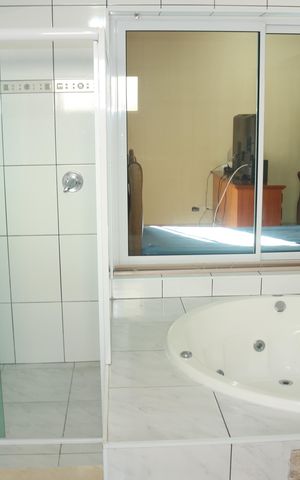Casa à venda com 300m², 4 quartos e 4 vagasBanheiro da Suíte 1