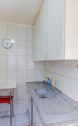 Apartamento à venda com 49m², 2 quartos e 1 vaga Apartamento à venda com 49m², 2 quartos e 1 vagaCozinha e Área de Serviço