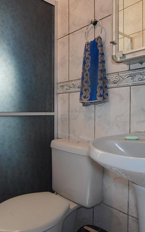 Casa à venda com 190m², 4 quartos e 4 vagasBanheiro Corredor 1