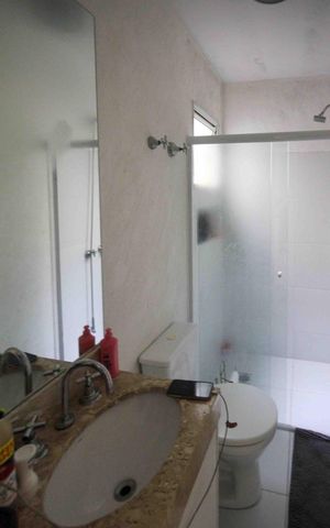 Casa de condomínio à venda com 164m², 3 quartos e 3 vagas Casa de condomínio à venda com 164m², 3 quartos e 3 vagasBanheiro da Suite