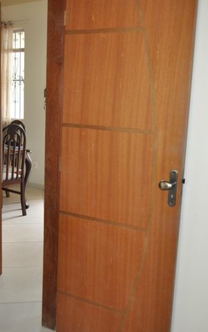 Casa de condomínio à venda com 110m², 4 quartos e 1 vagaPorta do Quarto 1
