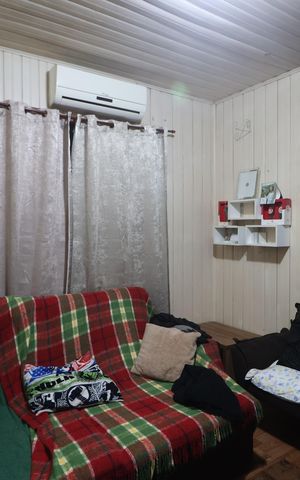 Casa à venda com 160m², 2 quartos e 3 vagasSala de TV