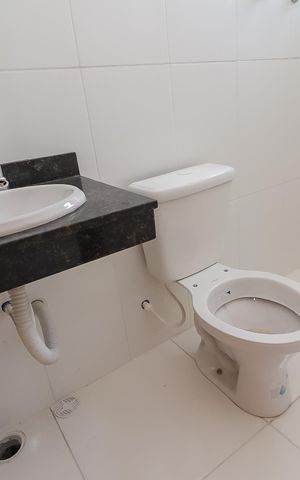 Casa de condomínio para alugar com 68m², 2 quartos e 2 vagasBanheiro da Suíte 1