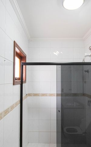 Casa de condomínio à venda com 405m², 6 quartos e 8 vagas Casa de condomínio à venda com 405m², 6 quartos e 8 vagasBanheiro da Suíte 3