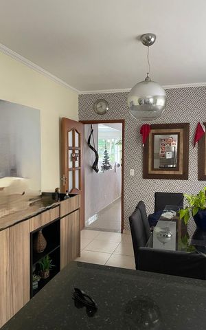 Casa à venda com 100m², 3 quartos e 2 vagas Casa à venda com 100m², 3 quartos e 2 vagasCozinha