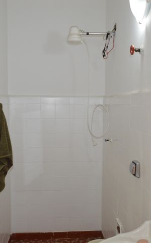 Casa de condomínio à venda com 110m², 3 quartos e 2 vagasBanheiro de Serviço