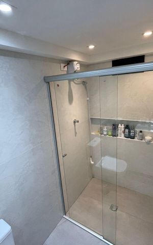 Apartamento à venda com 70m², 2 quartos e 2 vagas Apartamento à venda com 70m², 2 quartos e 2 vagasBanheiro da Suíte 1