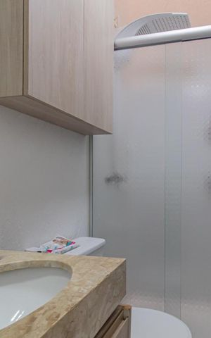 Casa de condomínio à venda com 180m², 3 quartos e 3 vagas Casa de condomínio à venda com 180m², 3 quartos e 3 vagasBanheiro da Suíte 1