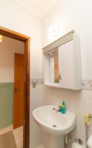 Casa à venda com 164m², 3 quartos e 4 vagasBanheiro da Suíte 03
