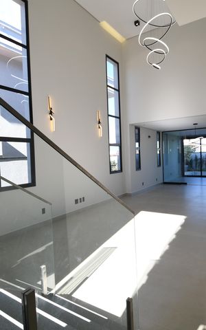 Casa de condomínio à venda com 420m², 5 quartos e 4 vagasSala
