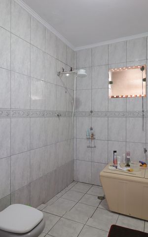 Casa à venda com 132m², 3 quartos e sem vagaBanheiro da Suíte