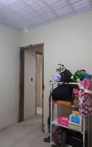 Casa à venda com 112m², 2 quartos e sem vagaQuarto 1