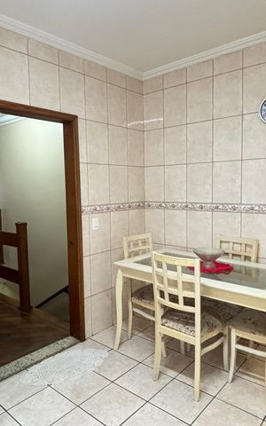 Casa à venda com 127m², 2 quartos e 2 vagas Casa à venda com 127m², 2 quartos e 2 vagasCozinha