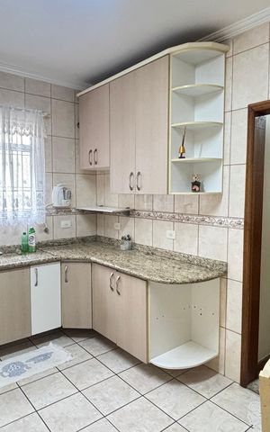 Casa à venda com 127m², 2 quartos e 2 vagas Casa à venda com 127m², 2 quartos e 2 vagasCozinha