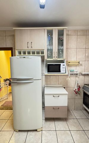 Casa à venda com 127m², 2 quartos e 2 vagas Casa à venda com 127m², 2 quartos e 2 vagasCozinha
