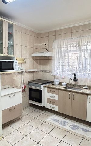 Casa à venda com 127m², 2 quartos e 2 vagas Casa à venda com 127m², 2 quartos e 2 vagasCozinha