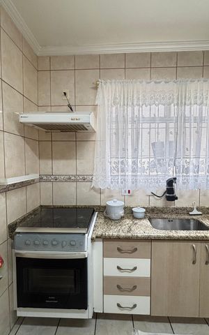 Casa à venda com 127m², 2 quartos e 2 vagas Casa à venda com 127m², 2 quartos e 2 vagasCozinha