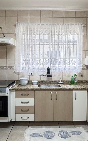 Casa à venda com 127m², 2 quartos e 2 vagas Casa à venda com 127m², 2 quartos e 2 vagasCozinha