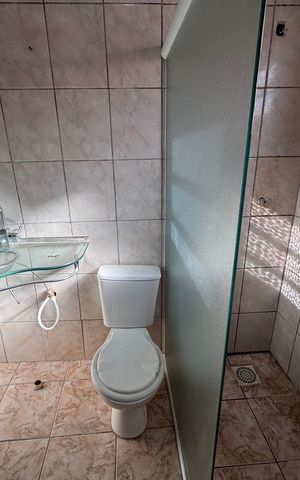 Casa à venda com 240m², 4 quartos e 3 vagas Casa à venda com 240m², 4 quartos e 3 vagasBanheiro 1