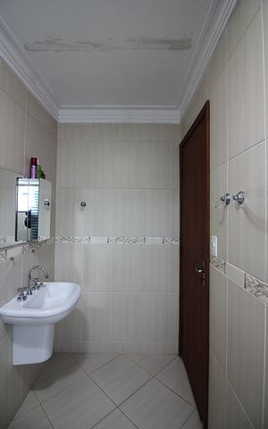 Casa à venda com 298m², 4 quartos e 5 vagasSuíte 02 Banheiro