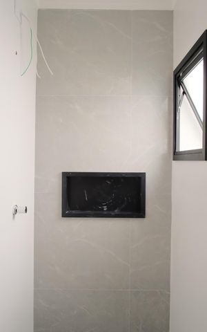 Casa à venda com 130m², 3 quartos e 2 vagasBanheiro da Suíte 1