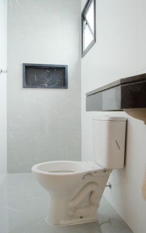 Casa à venda com 130m², 3 quartos e 2 vagasBanheiro da Suíte 1