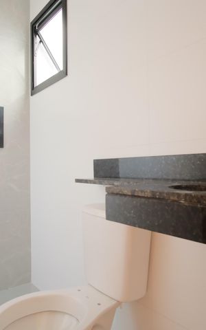 Casa à venda com 130m², 3 quartos e 2 vagasBanheiro da Suíte 2