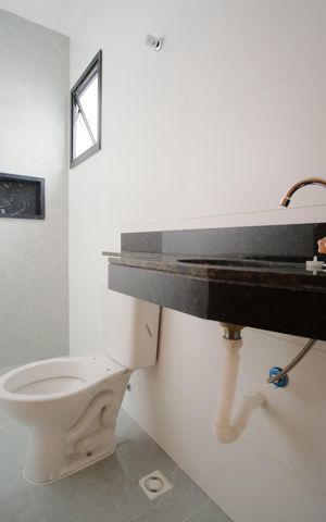 Casa à venda com 130m², 3 quartos e 2 vagasBanheiro da Suíte 1