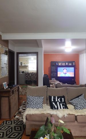 Casa à venda com 138m², 3 quartos e 2 vagasSala