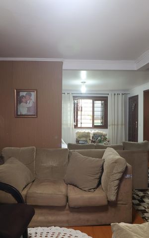 Casa à venda com 138m², 3 quartos e 2 vagasSala de TV