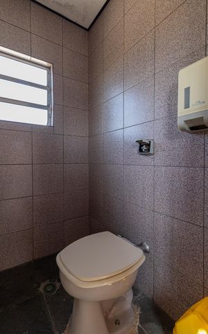 Casa à venda com 310m², 4 quartos e 4 vagasBanheiro