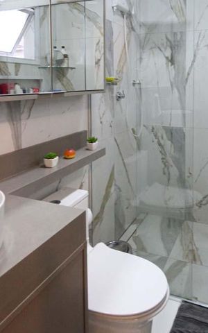 Casa à venda com 200m², 3 quartos e 2 vagas Casa à venda com 200m², 3 quartos e 2 vagasBanheiro da Suite