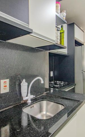 Apartamento à venda com 48m², 2 quartos e 1 vaga Apartamento à venda com 48m², 2 quartos e 1 vagaCozinha e Área de Serviço