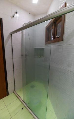 Casa de condomínio à venda com 400m², 5 quartos e 2 vagas Casa de condomínio à venda com 400m², 5 quartos e 2 vagasBanheiro da Suíte 2
