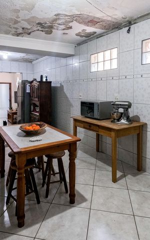 Casa à venda com 111m², 5 quartos e 3 vagas Casa à venda com 111m², 5 quartos e 3 vagasCozinha 1