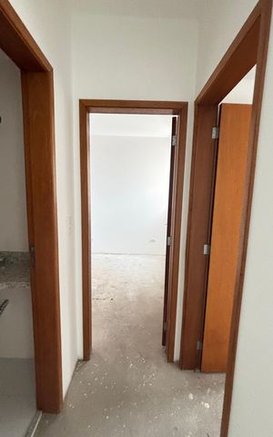 Apartamento à venda com 60m², 2 quartos e 2 vagas Apartamento à venda com 60m², 2 quartos e 2 vagasCorredor