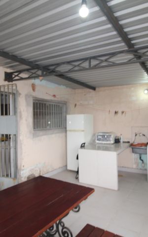 Casa à venda com 500m², 3 quartos e 3 vagasCasa 1 - Área de Serviço