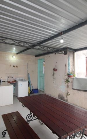 Casa à venda com 500m², 3 quartos e 3 vagasCasa 1 - Área de Serviço