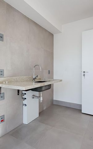 Apartamento à venda com 63m², 2 quartos e 1 vaga Apartamento à venda com 63m², 2 quartos e 1 vagaCozinha e Área de Serviço